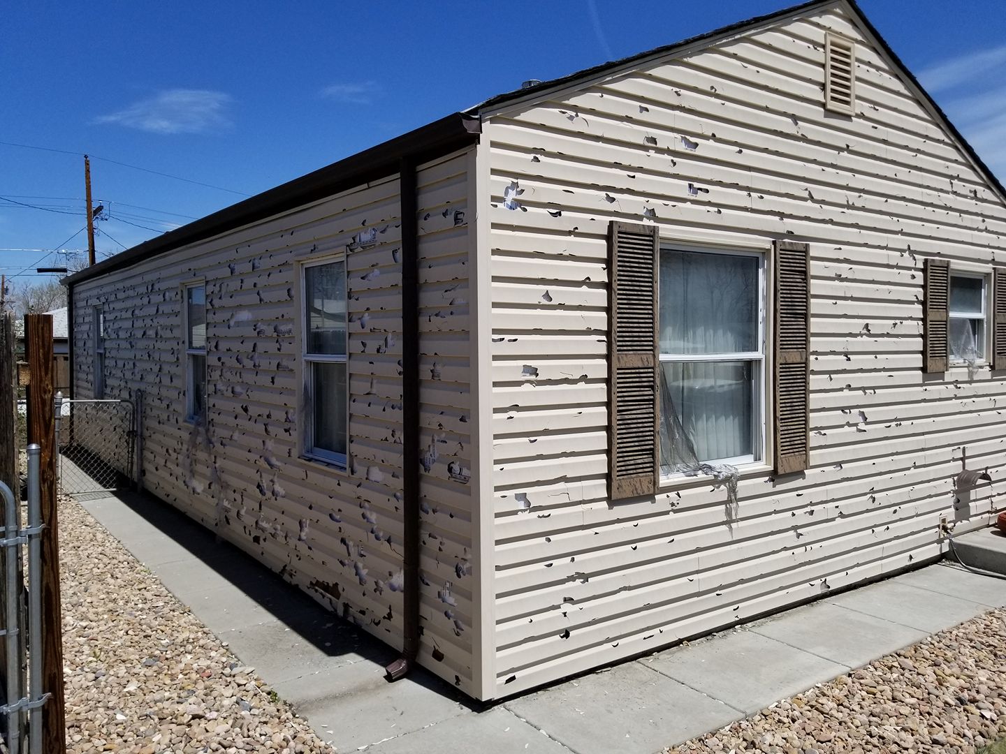 Exterior property damage to residential siding